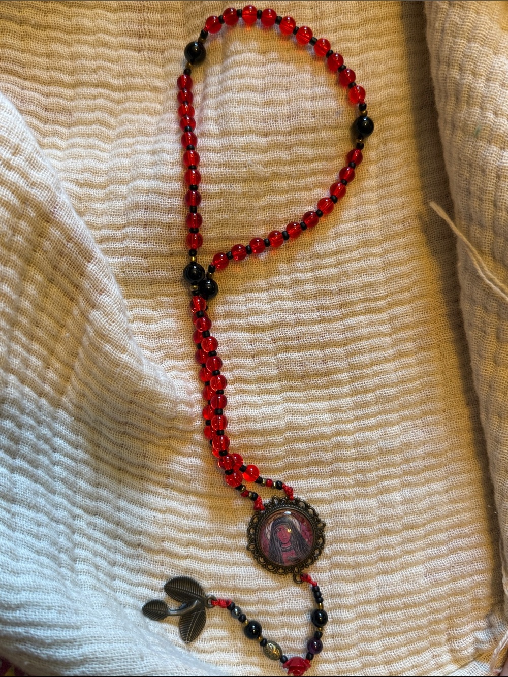 Red Beaded Pendant Necklace with Decorative Medallion